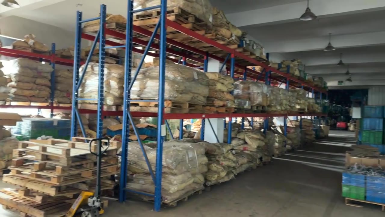 Racked raw material and steel stock on the second floor of the Zhenkai Tools plant