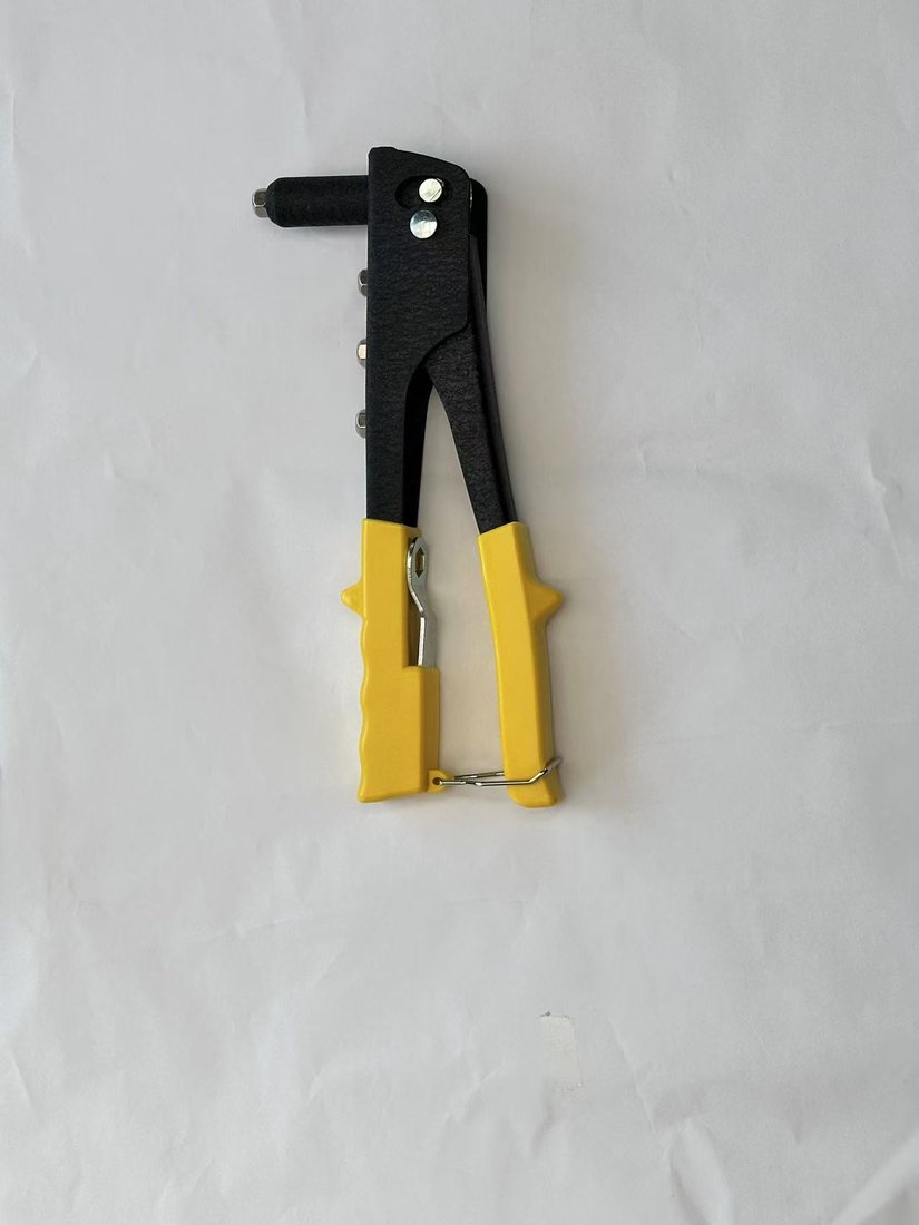 Hand riveter with yellow grips
